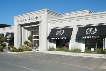Curved fixed canopy