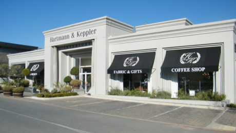 Curved fixed canopy